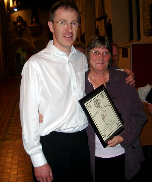 Roger Bleach presents Janet Clements with Life Membership of the Band