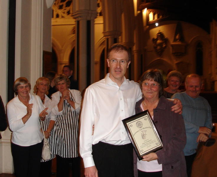 Roger Bleach presents Janet Clements with Life Membership of the Band