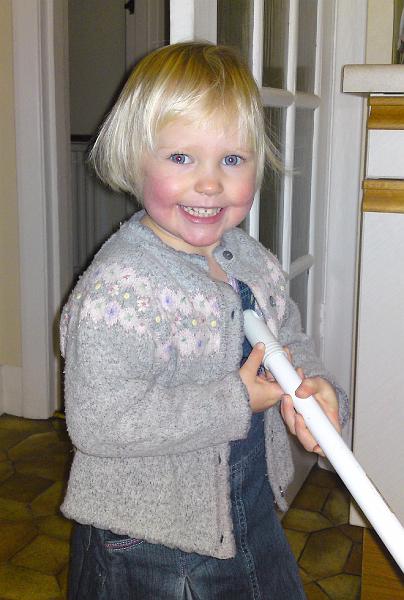 DSC00080.JPG - Hannah cleaning Grandma's  kitchen floor