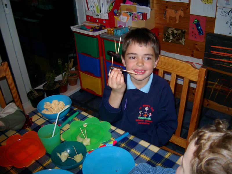 Making a figure with sausage and sticks