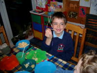 Making a figure with sausage and sticks